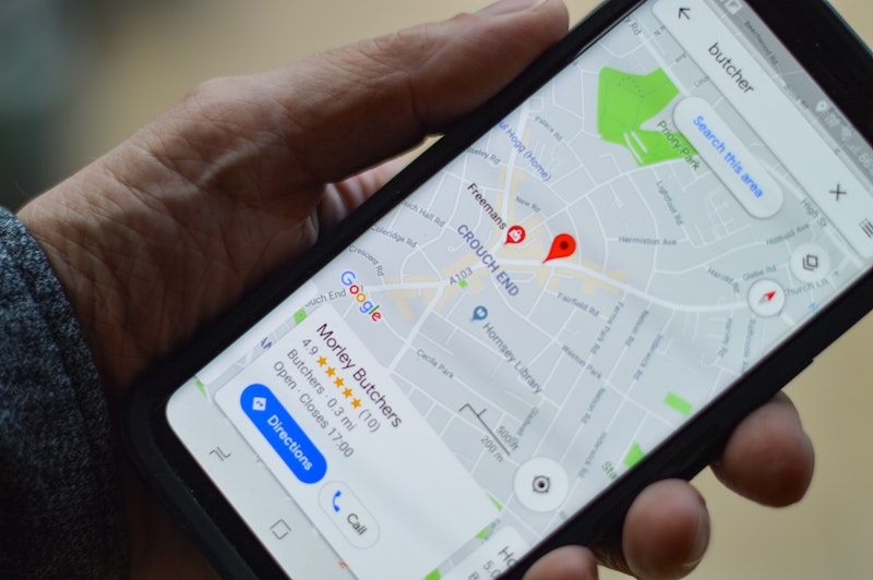 person with maps open on their mobile phone