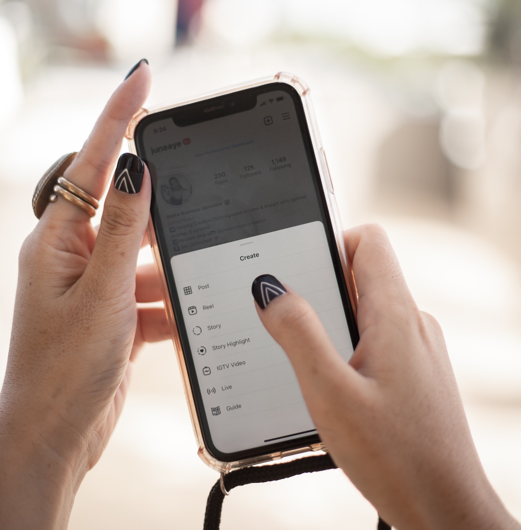 image of person holding a mobile phone with instagram reels pulled up